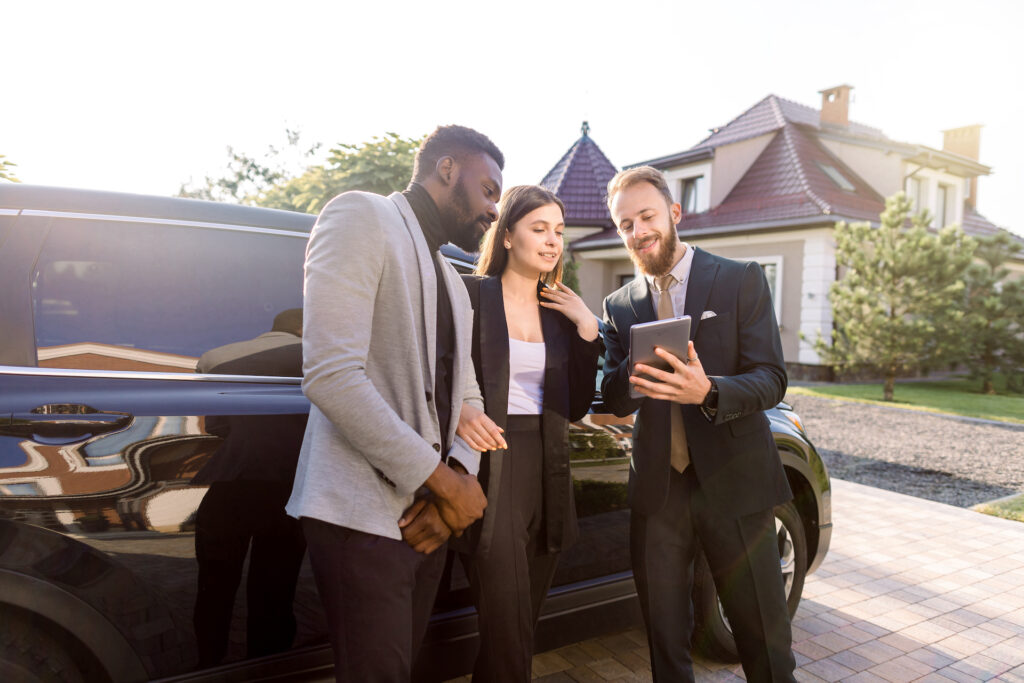 Image of a service advisory going over loaner vehicle contract with customers